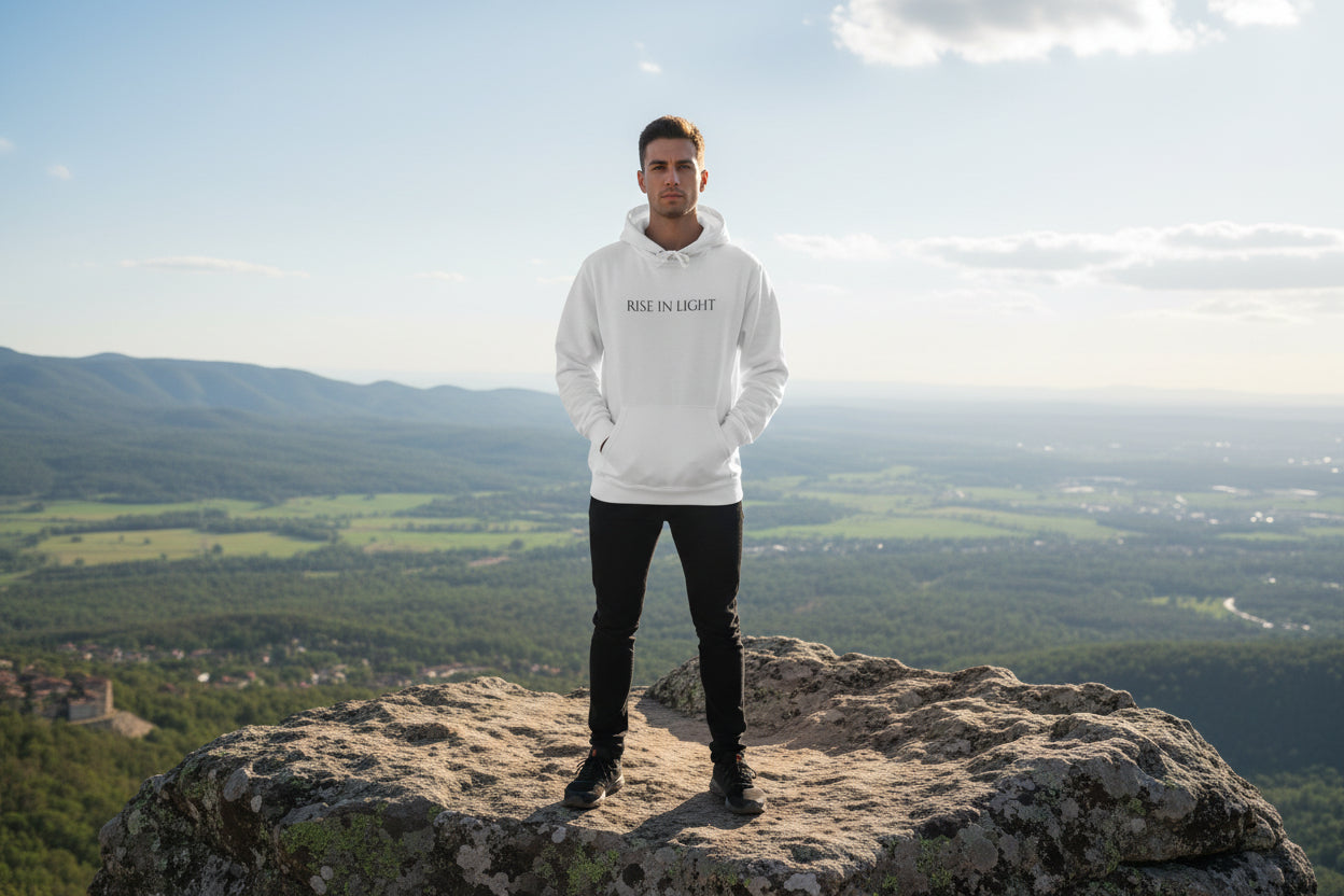 Rise In Light-The Power Of Faith Christian Hoodie. Font of hoodie with man wearing it.